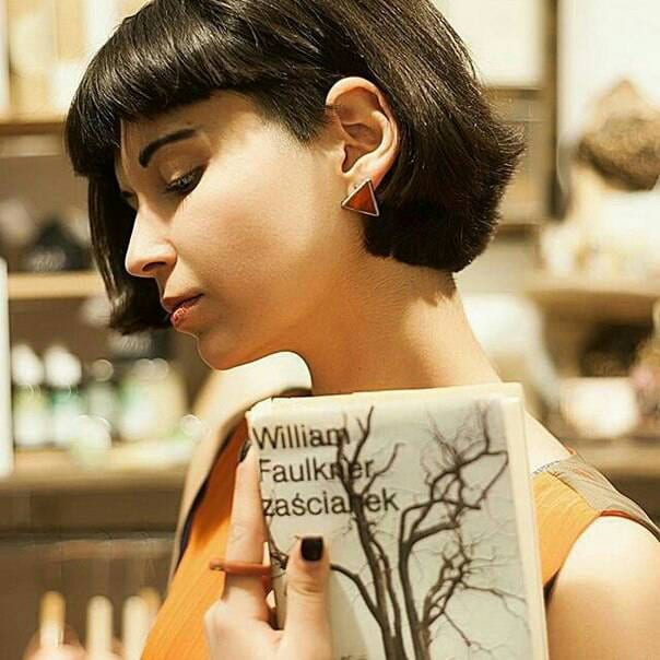 Red geometric stud earrings on model modern hipster jewelry