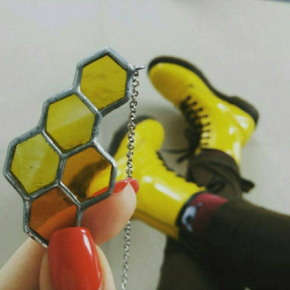 Honeycomb necklace worn on woman casual outfit