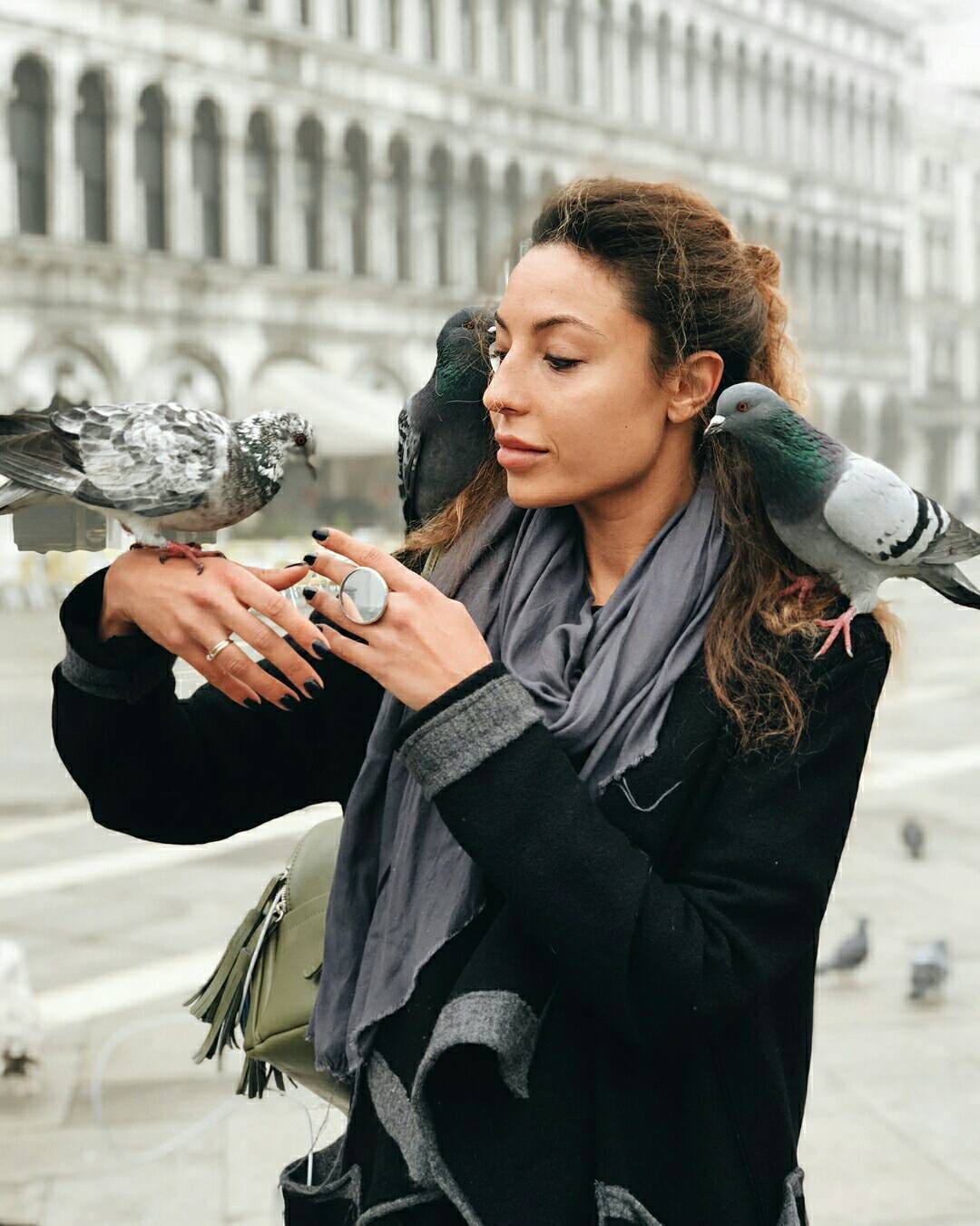 Mirror silver ring styled with minimalist outfit