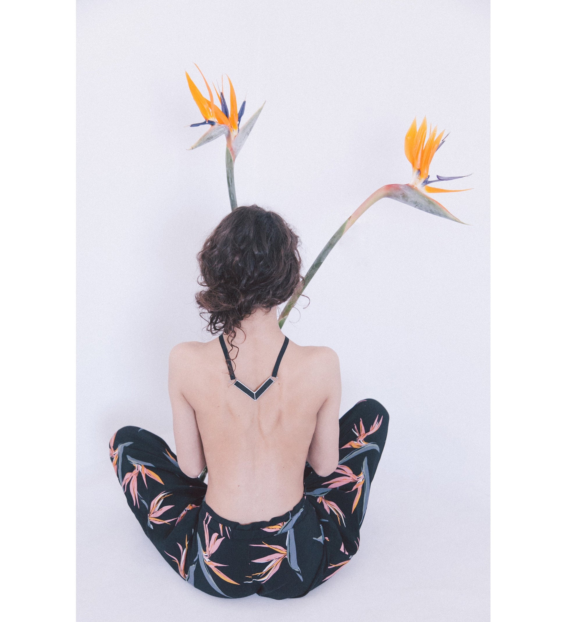 Black statement necklace on back view