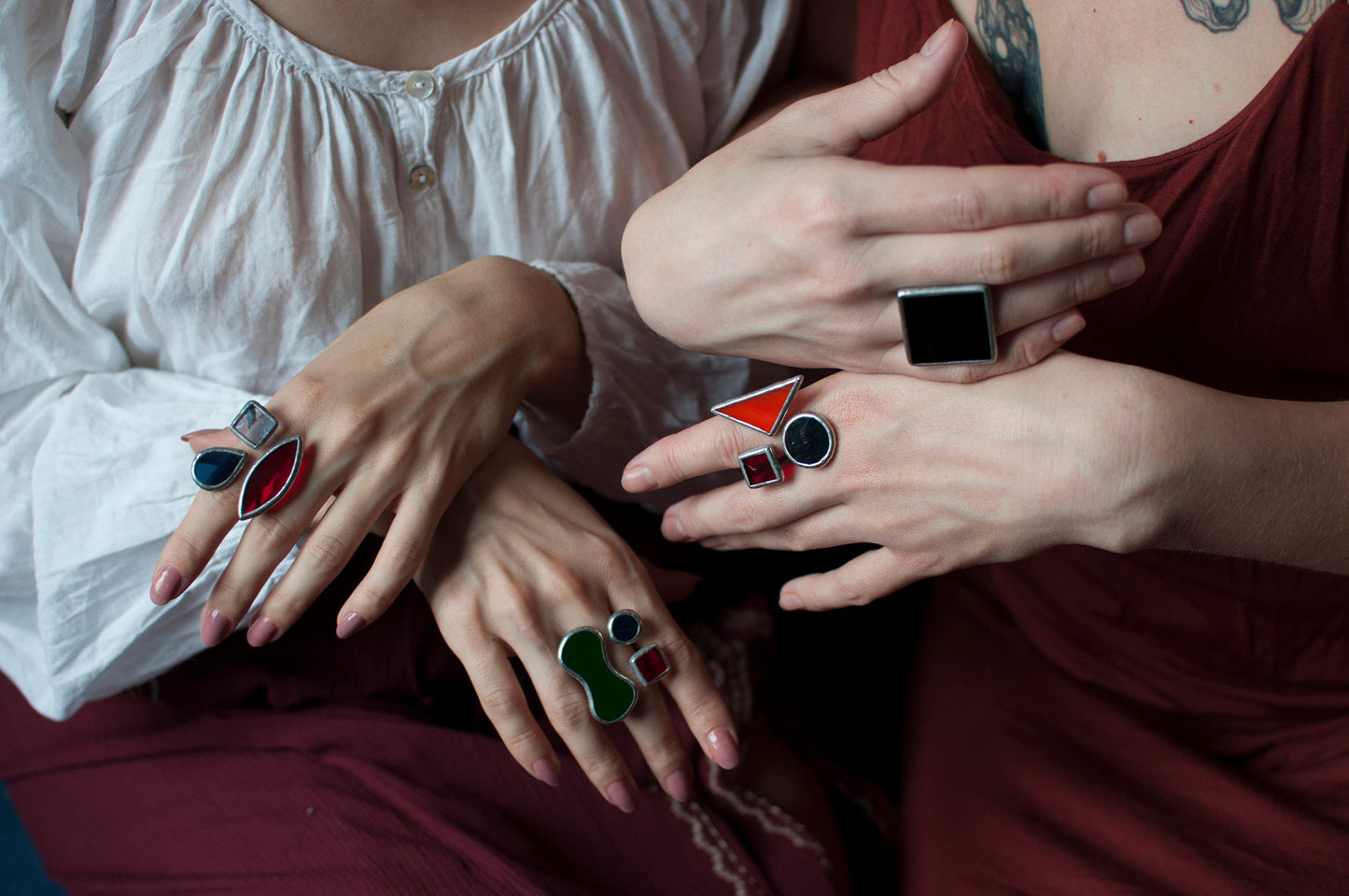 Elegant stained glass ring with colorful glass worn by woman — unique bold accessory for modern outfit