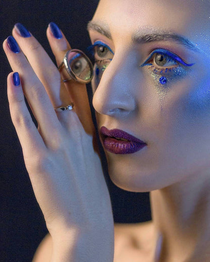 Statement mirror ring worn on hand, large round silver cocktail ring