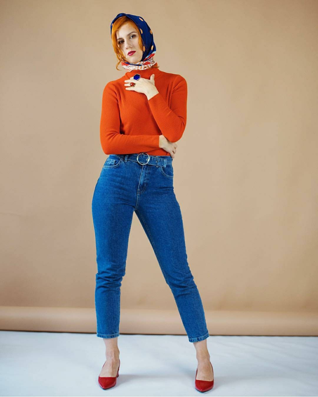 A full-body portrait of a woman wearing a bold chunky hexagon ring in ultramarine blue, styled as a large geometric statement piece. The deep indigo clear blue tone gives the jewelry a modern wabi-sabi feel, making it stand out as a chic accessory for women. The ring evokes honeycomb geometry and serves as a unique gift idea for a girlfriend, wife, or bestie who loves elegant and artistic handmade fashion.