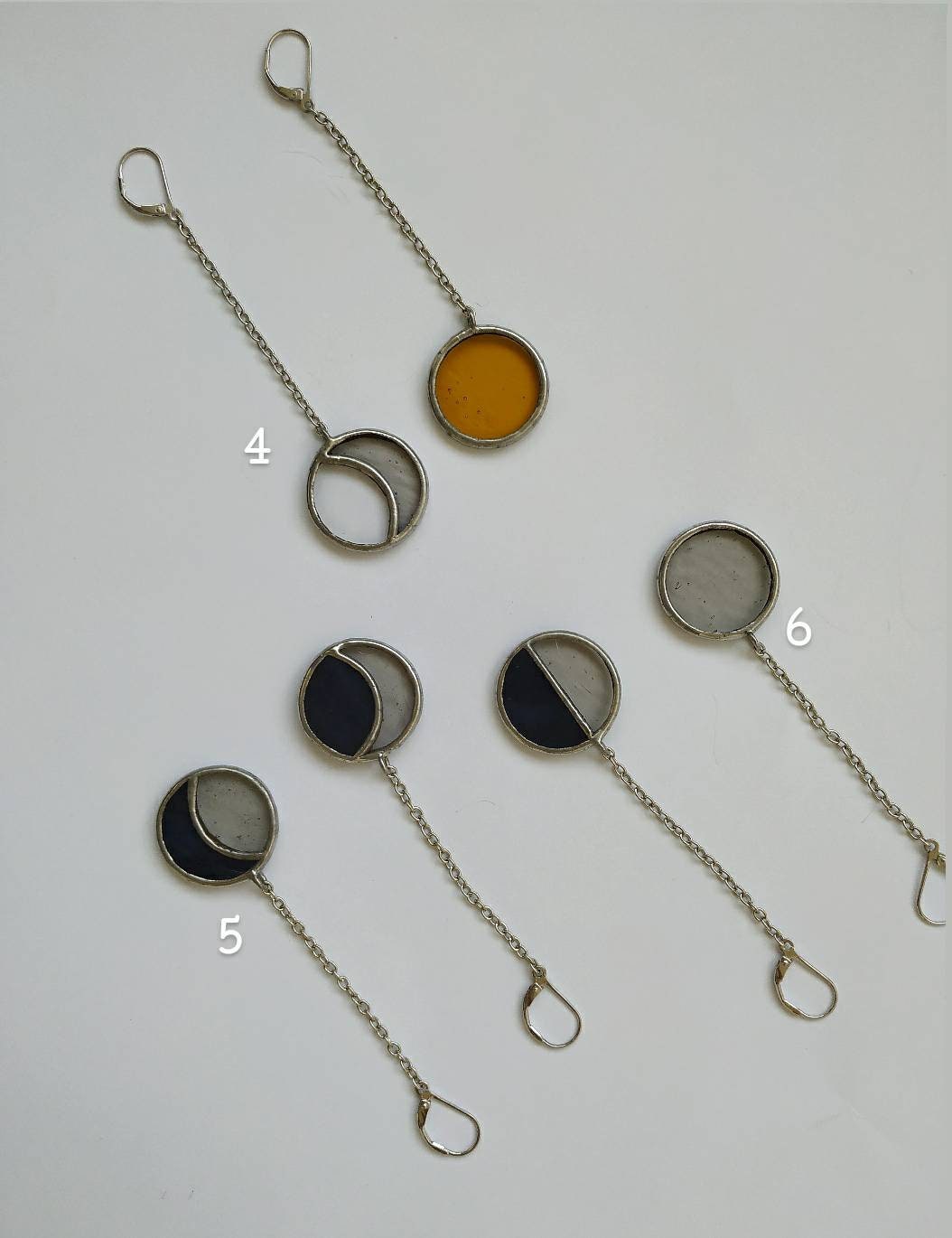 Numbered sun and moon stained glass earrings selection options