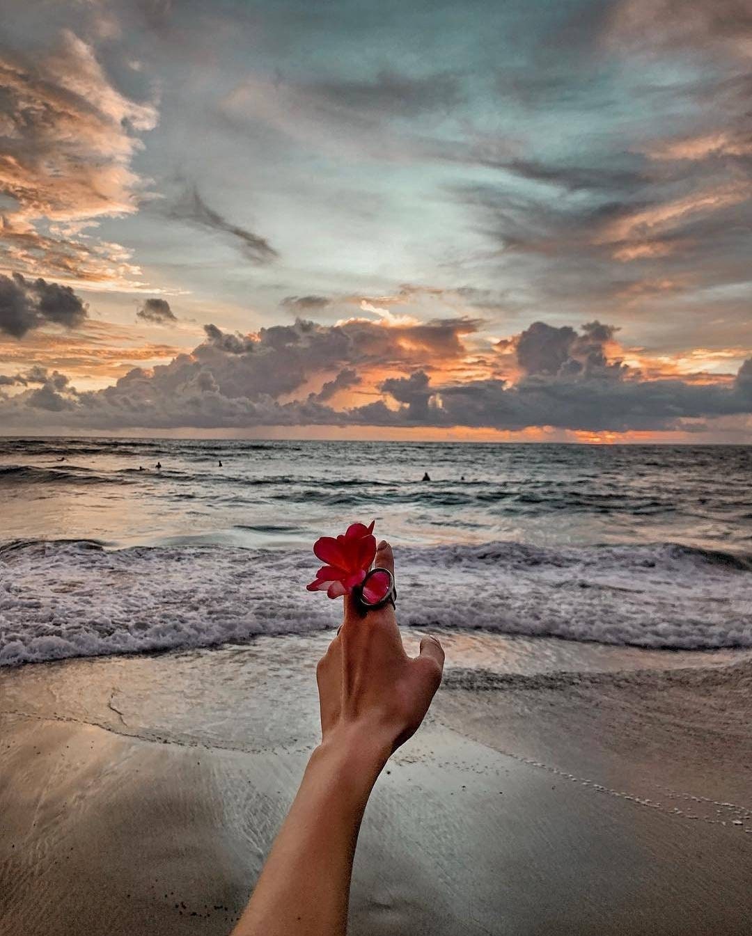 Handmade oval mirror ring reflecting light outdoors