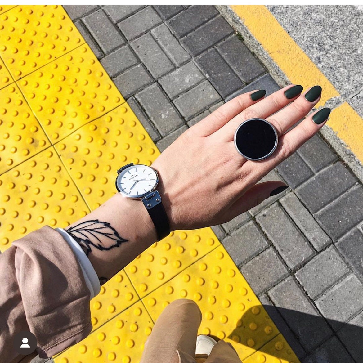 Black disc statement ring worn on hand, chunky gothic minimalist jewelry