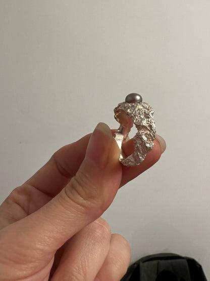 Bold textured silver ring with pearl side view