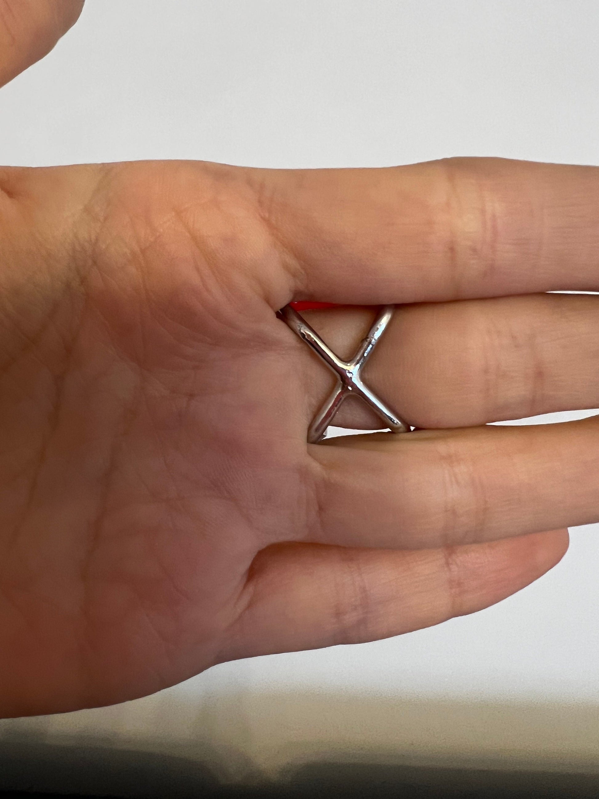 X-shaped fastening, which makes the ring comfortable to wear. Choose your size in variations