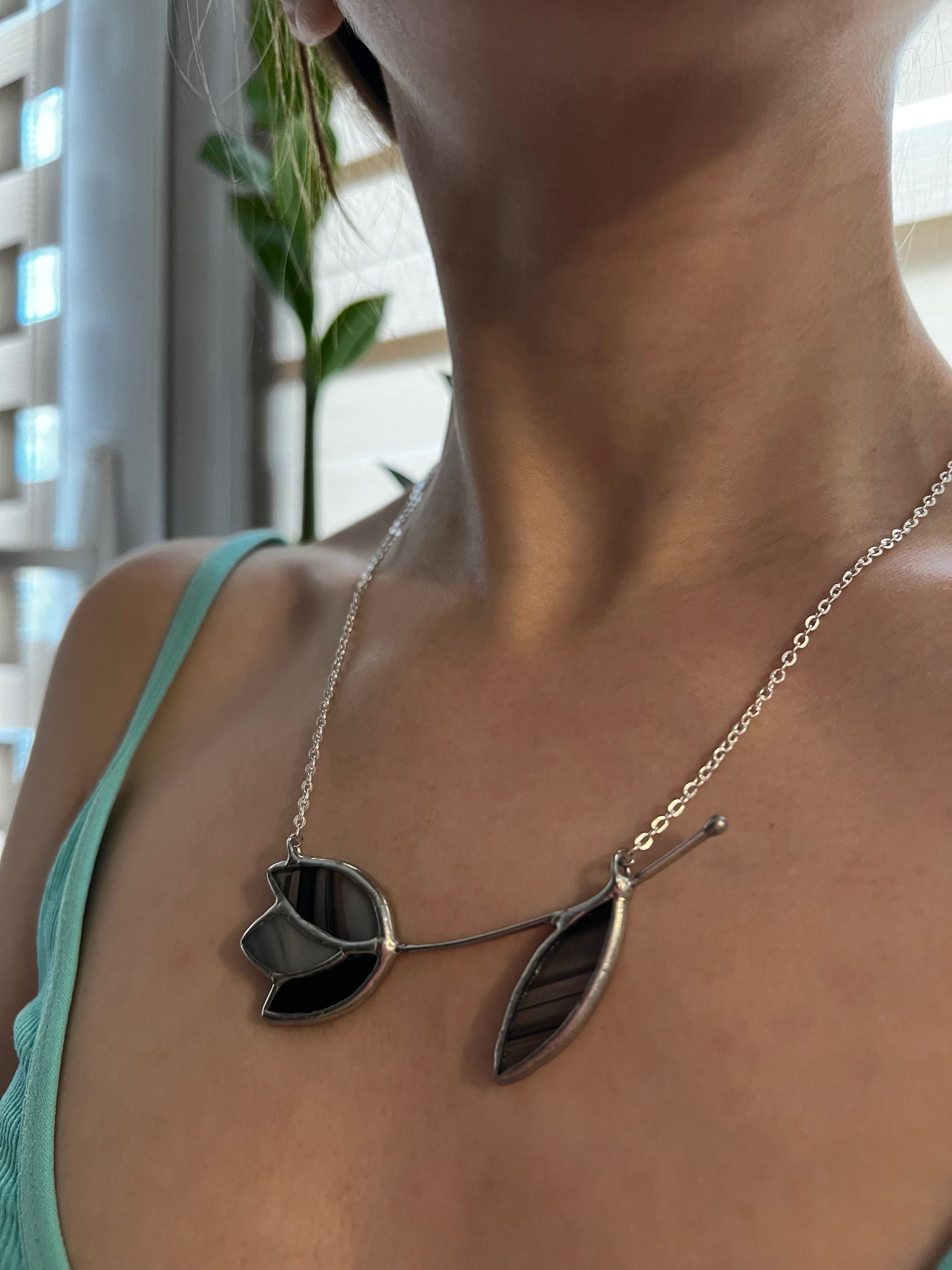Handmade botanical jewelry with tulip design