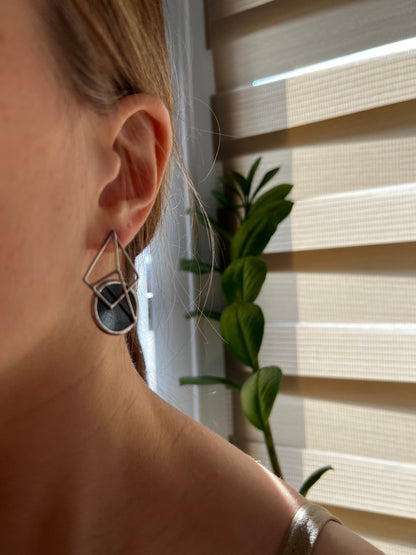 Silver framed stained glass earrings with circle design