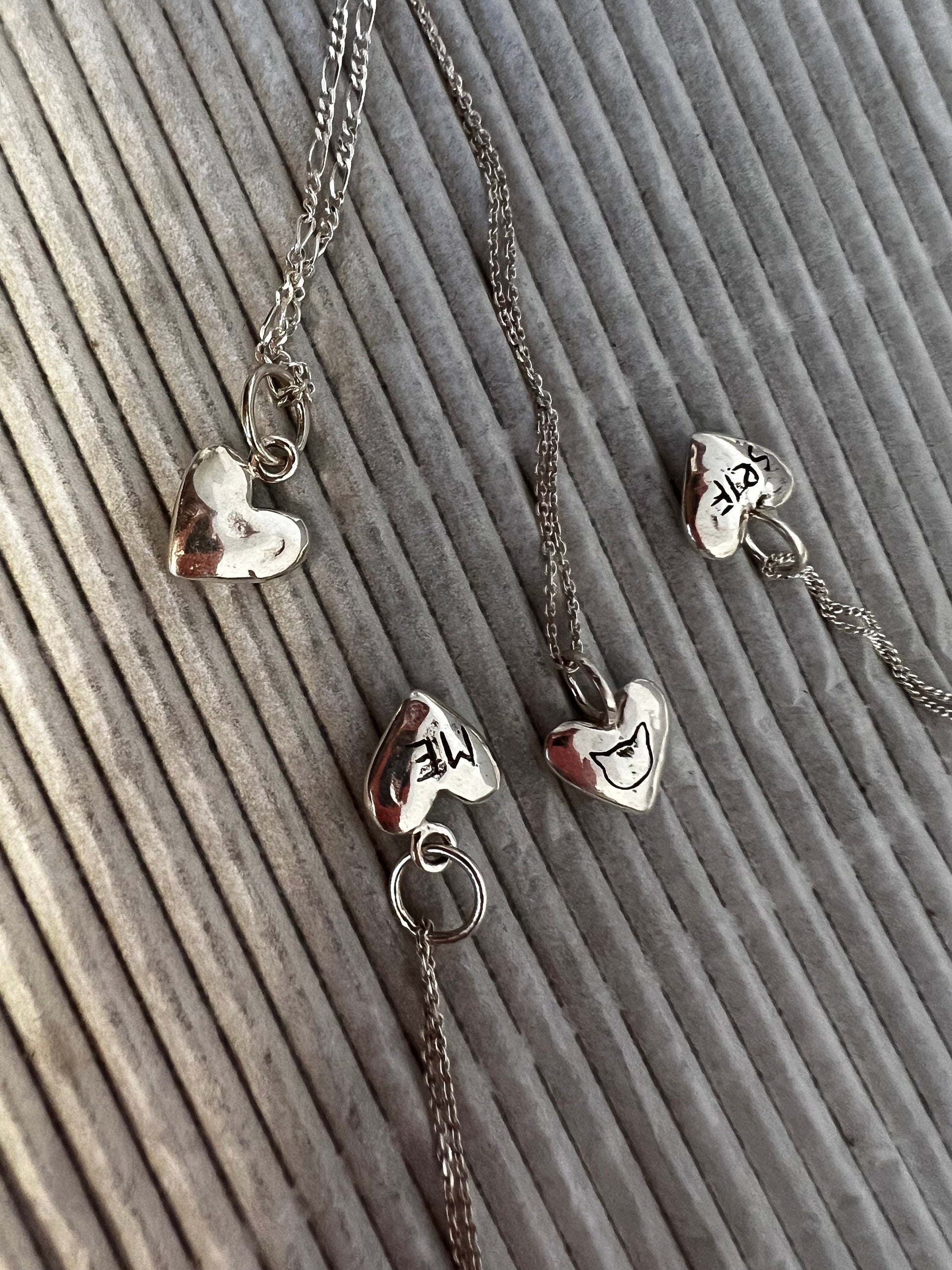 Custom engraved heart pendant with initials