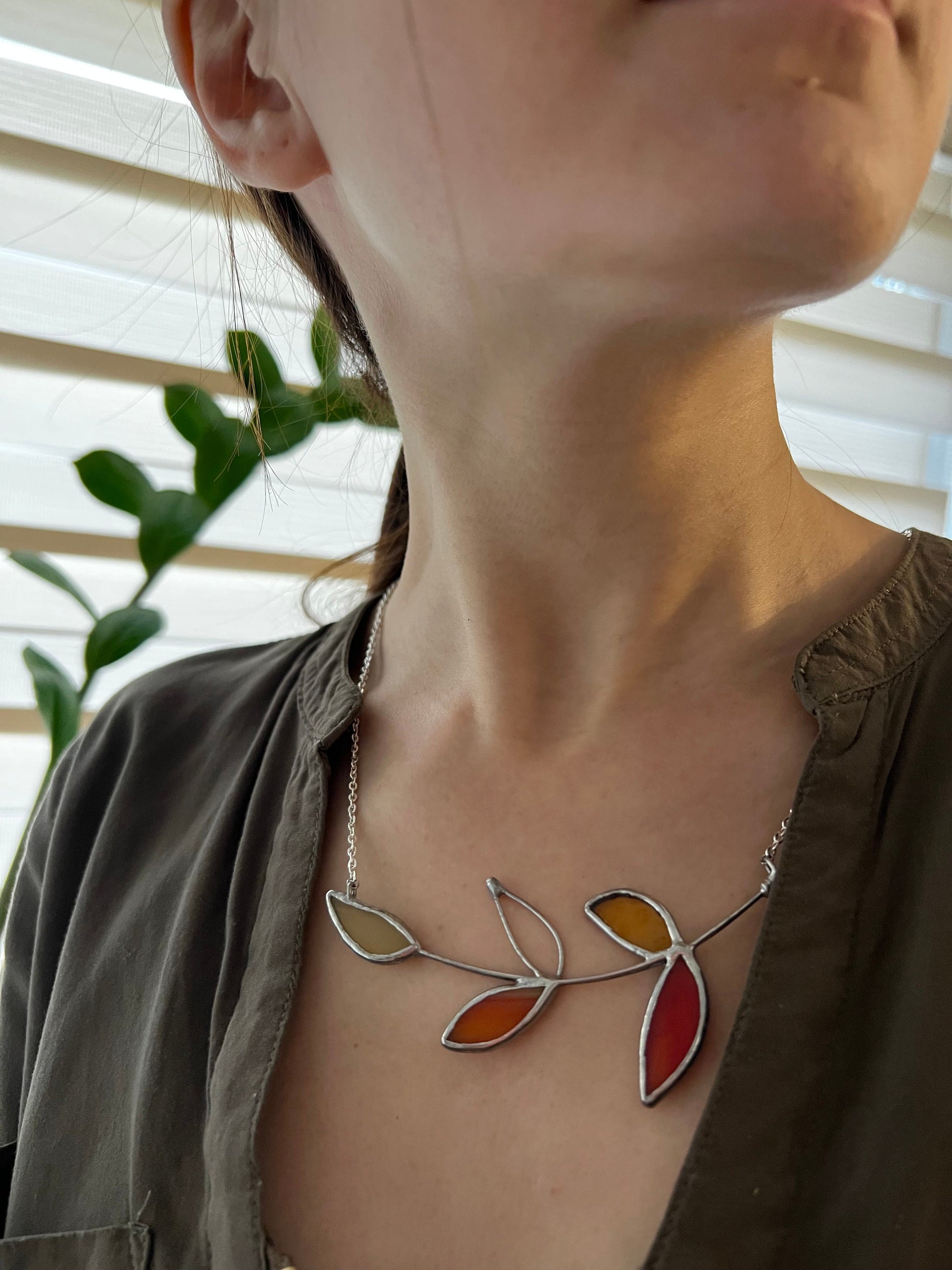 Colorful botanical necklace with mustard yellow, tangerine orange and ivory glass leaves, handmade pendant for garden lovers.