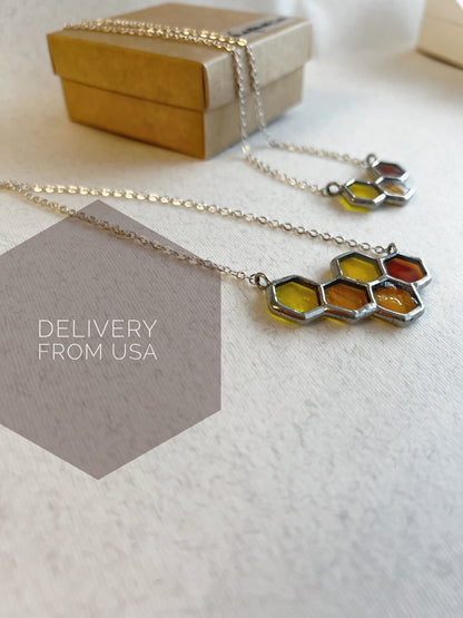 Yellow stained glass honeycomb pendant front view