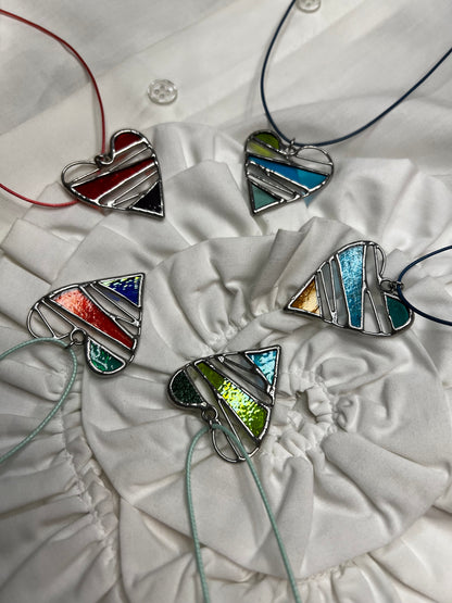 Colorful heart glass necklaces displayed together for Valentine gift