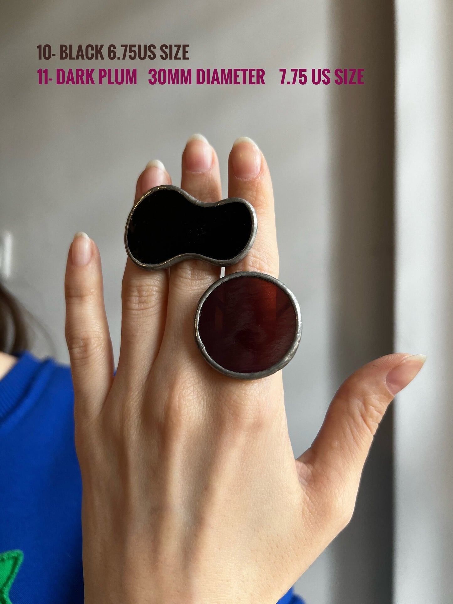 dark red bold disc ring on hand