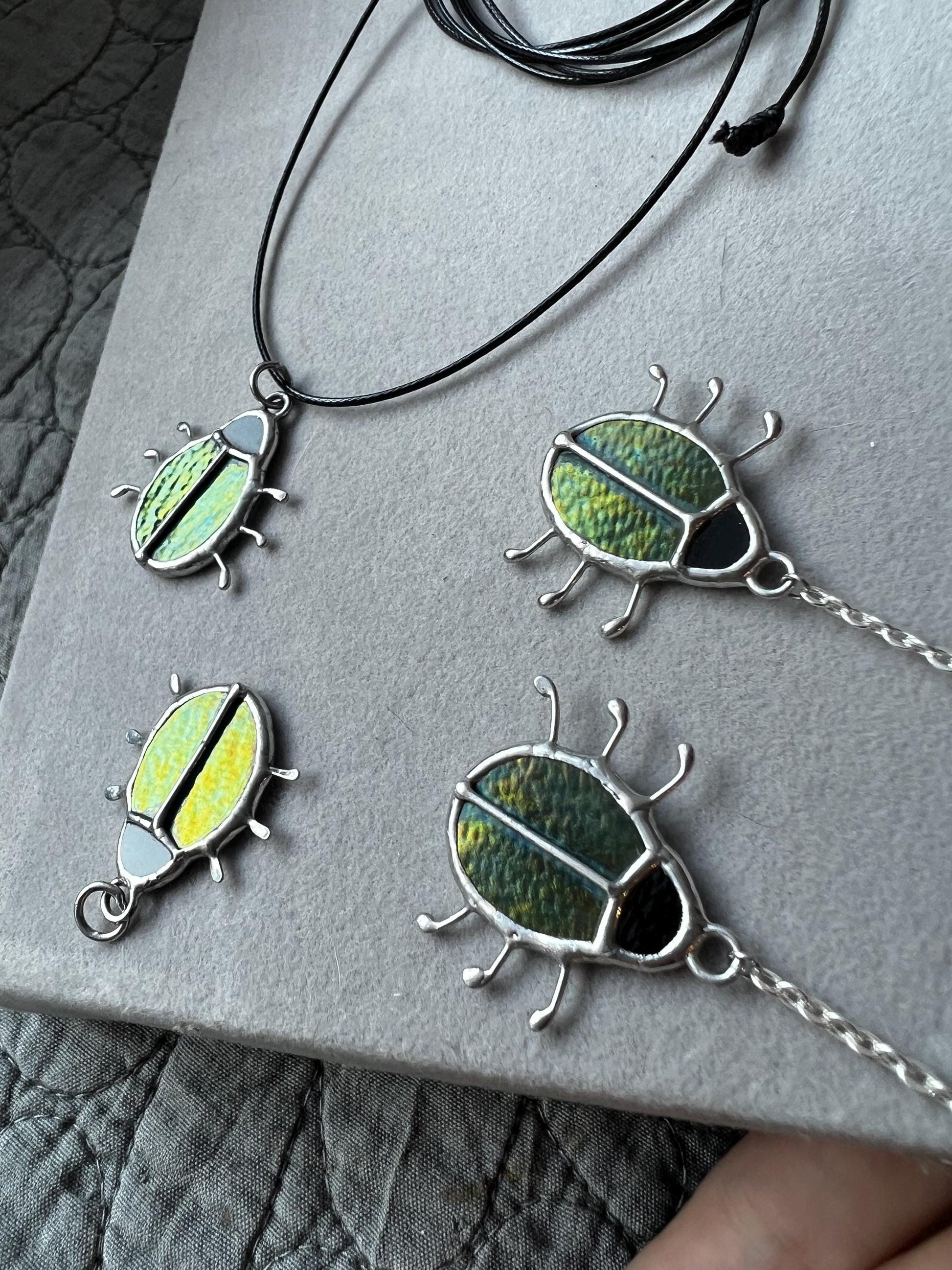 Bug pendant and matching earrings set in stained glass, green beetle jewelry