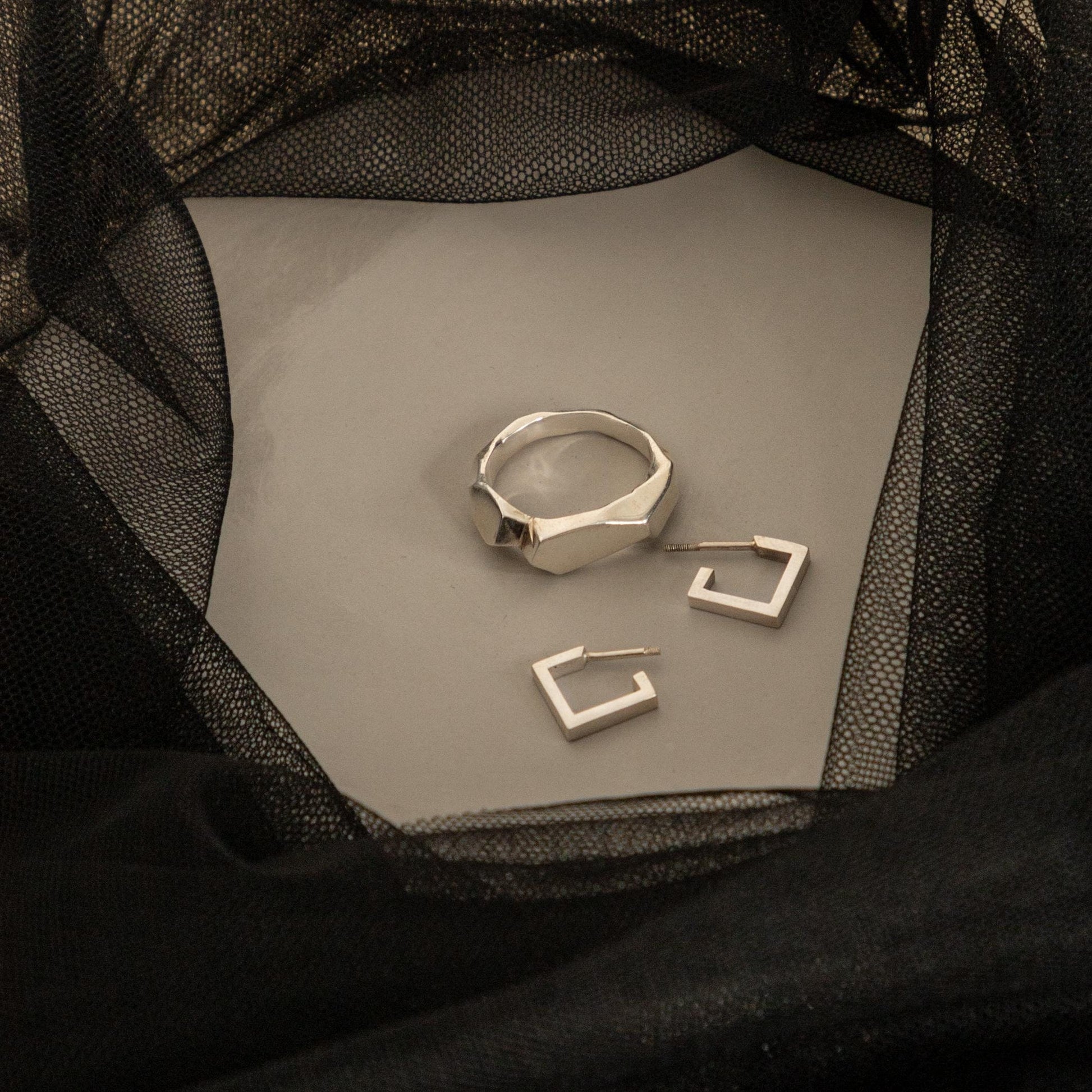 Handmade silver ring with raw rock texture, minimalist jewelry