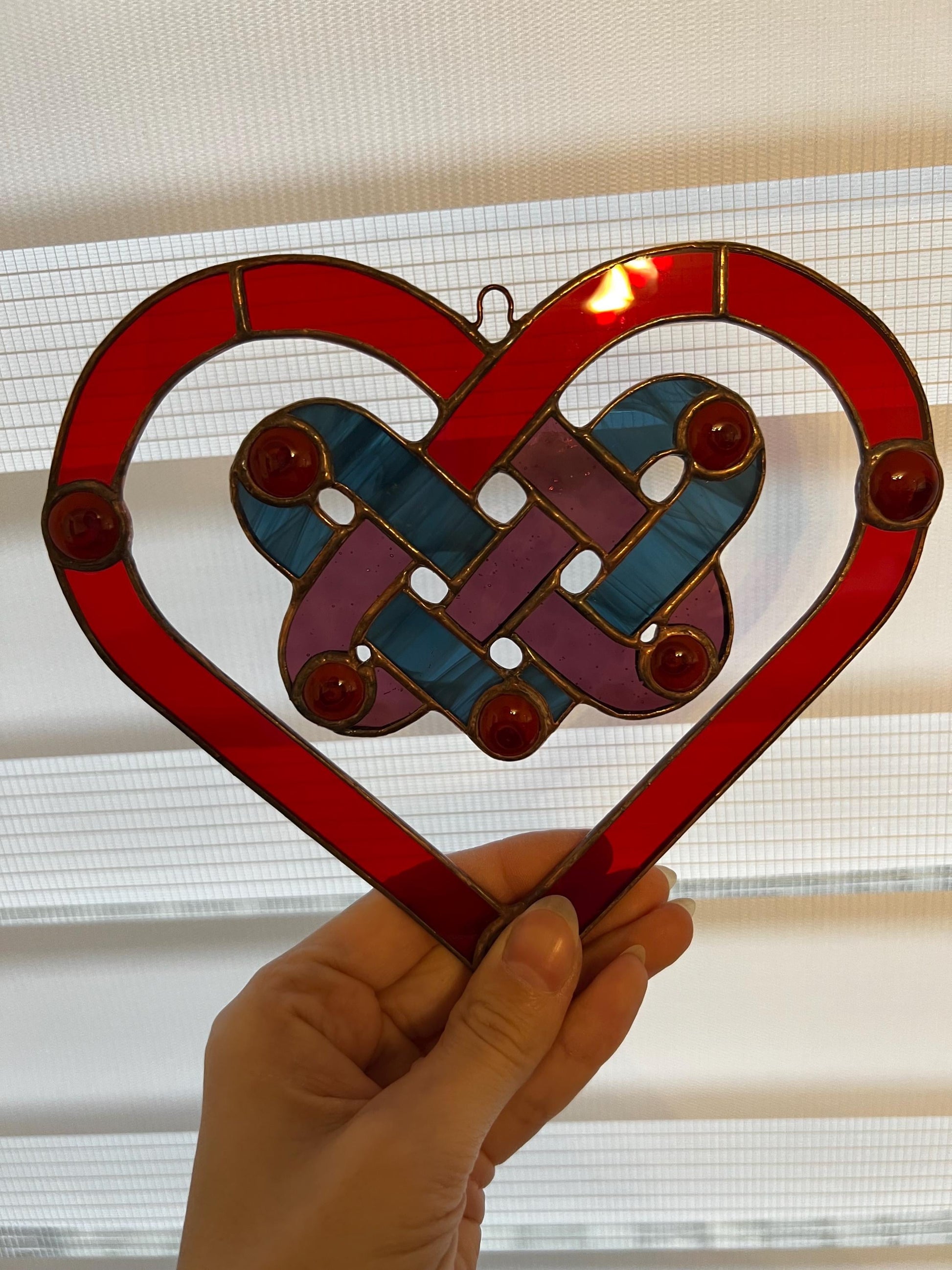 Red glass heart ornament for window hanging