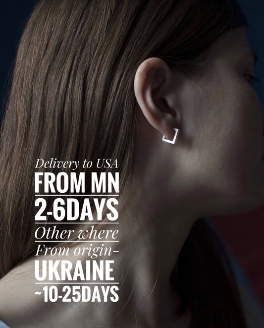 Minimal silver square stud earrings on model