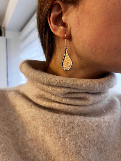 Lightweight stained glass earrings side view on model