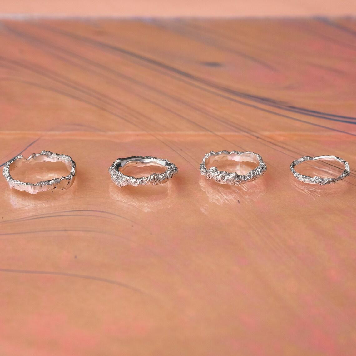 Handmade silver hammered ring worn as minimalist everyday jewelry