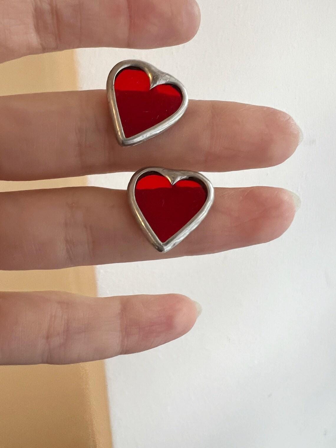 Red glass heart stud earrings pair view