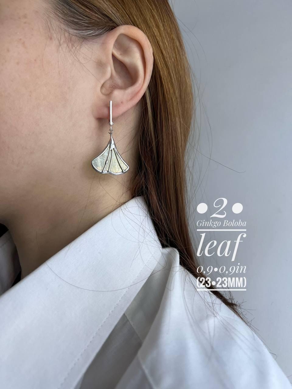 Stained glass leaf earrings worn side view, minimalist nature jewelry