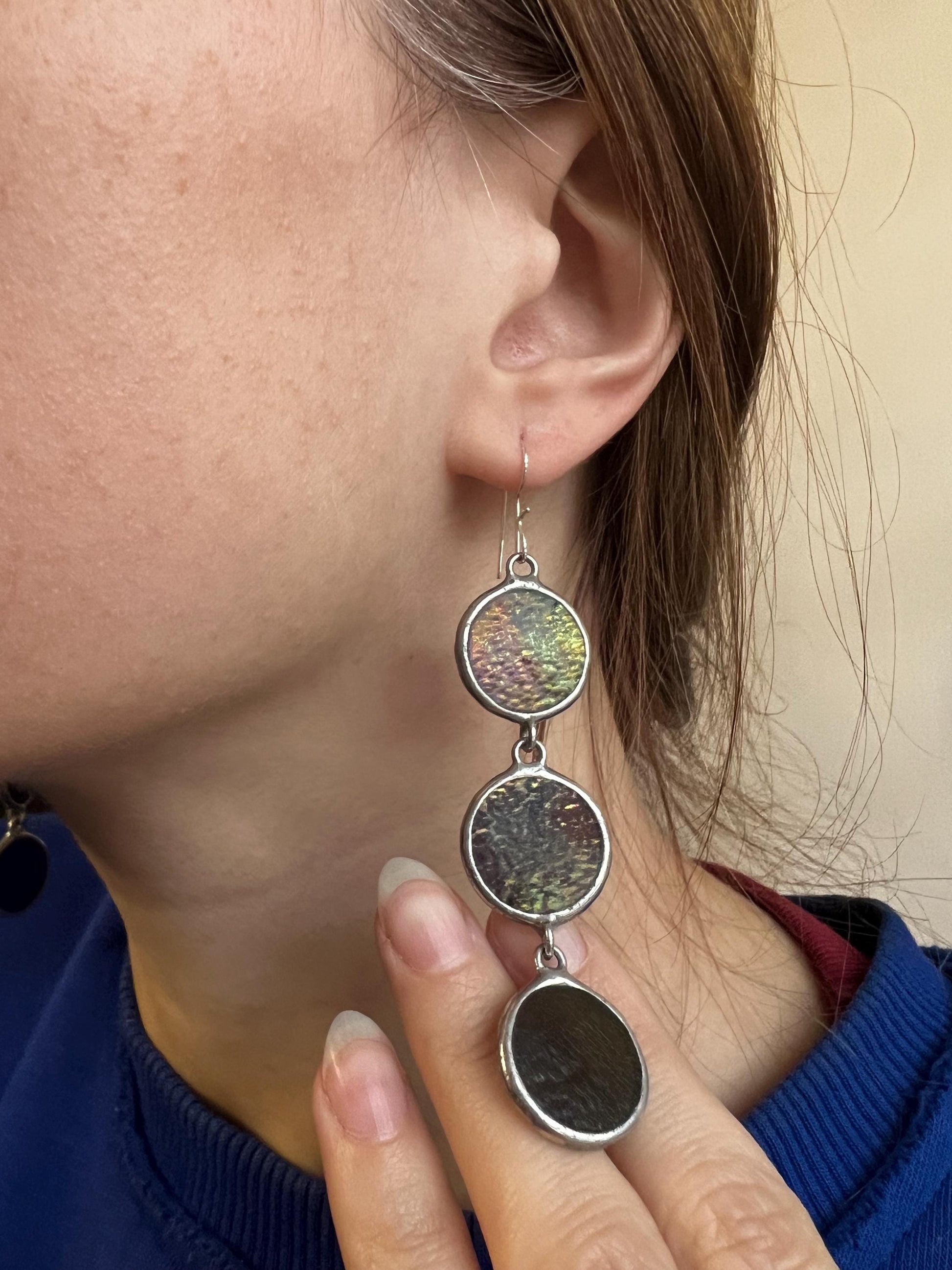 Long stained glass drop earrings with dark purple iridescent circles