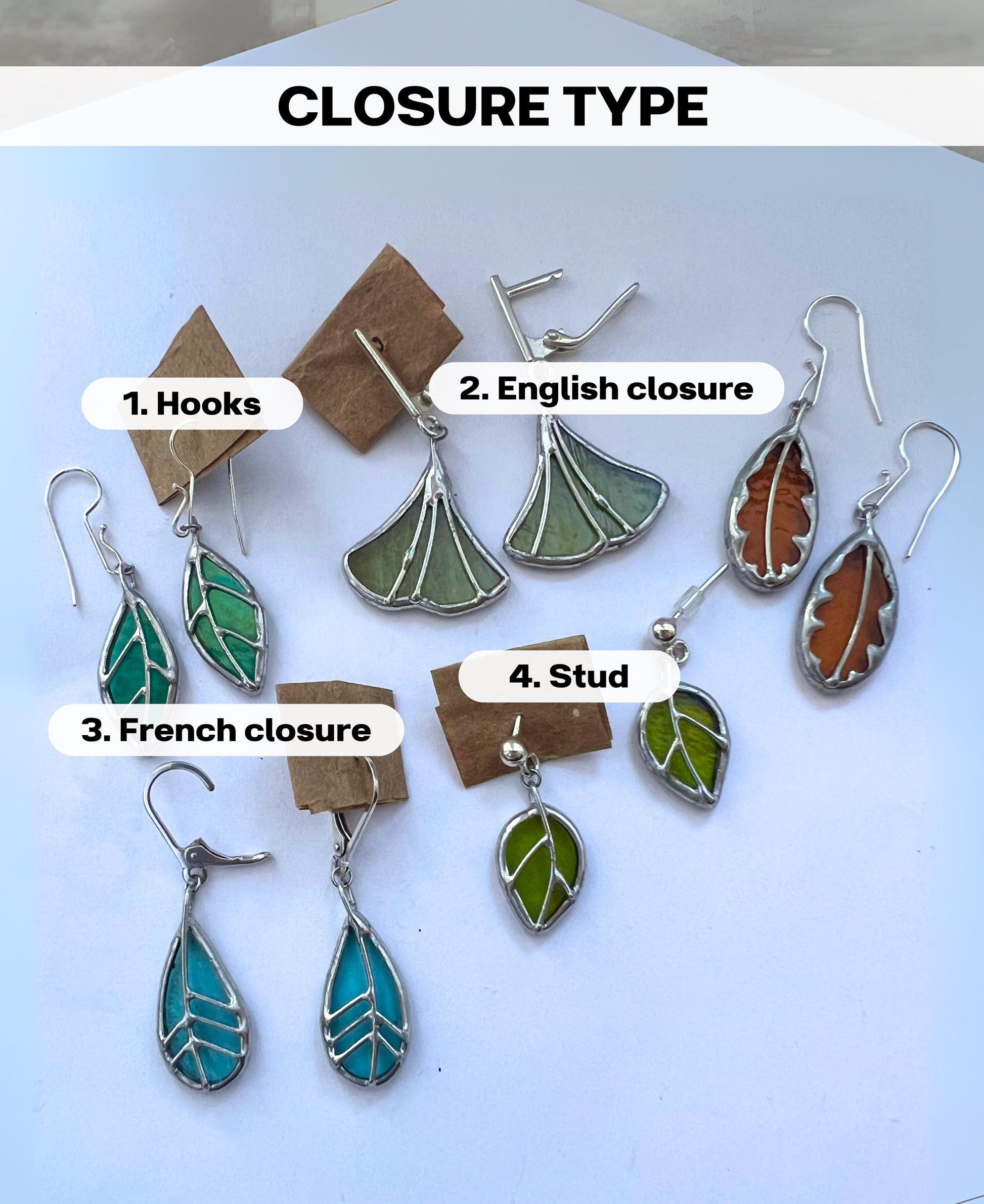 Botanical stained glass earrings with different leaf shapes and colors