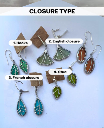 Botanical stained glass earrings with different leaf shapes and colors