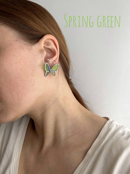 Nature-inspired earrings with spring green glass shaped into butterfly wings