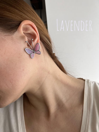Nature-inspired earrings with soft lavender glass shaped into butterfly wings