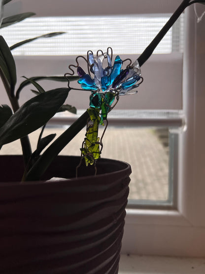 Fused glass fantasy flower stake placed in a plant pot