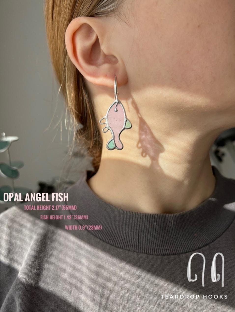 Cute fish dangle earrings on ear, nautical animal jewelry