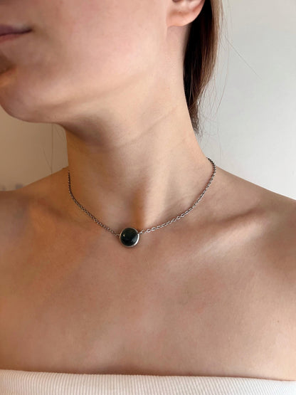Black glass choker necklace worn on neck, minimalist gothic jewelry