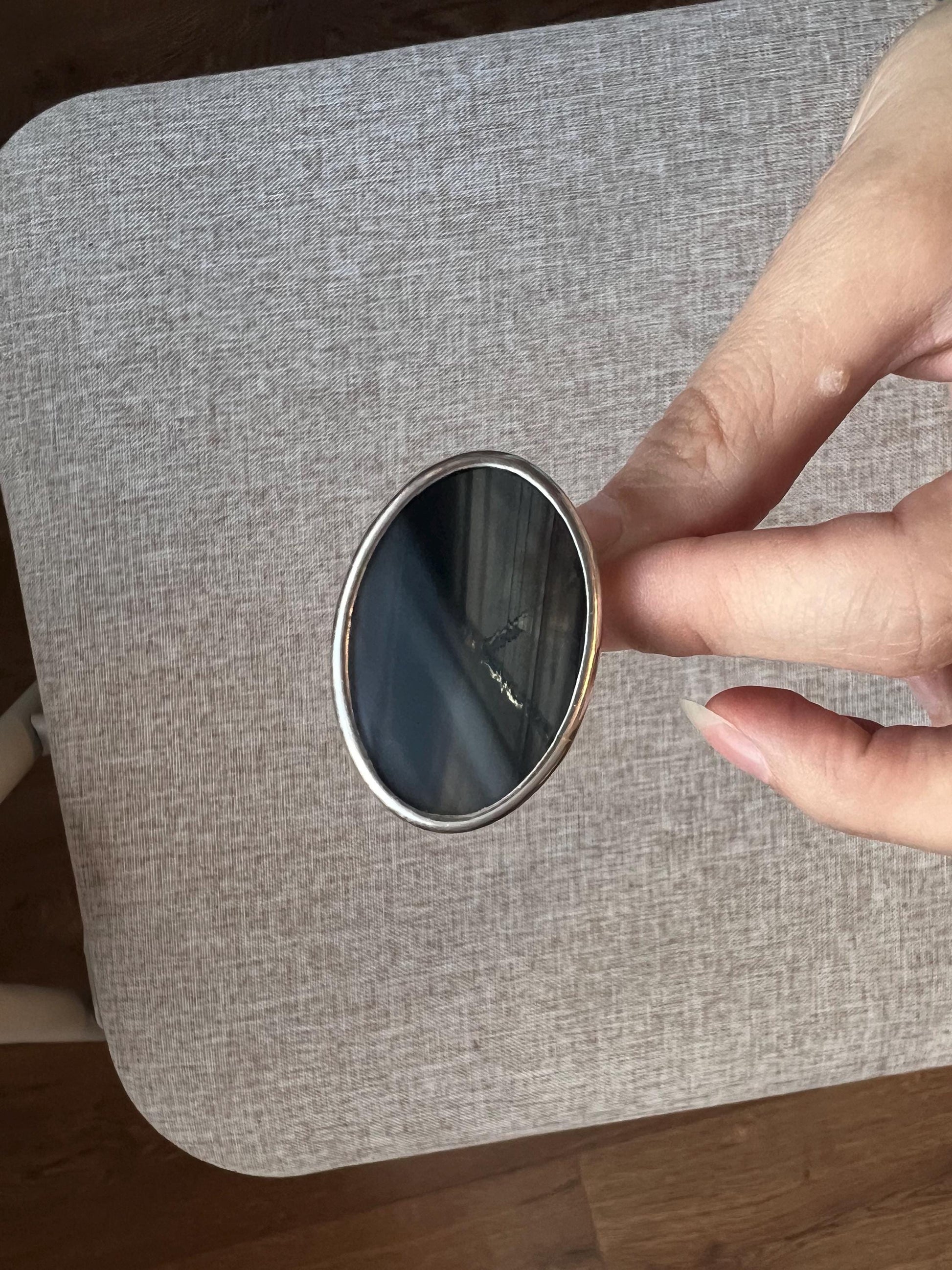 large black oval ring close-up