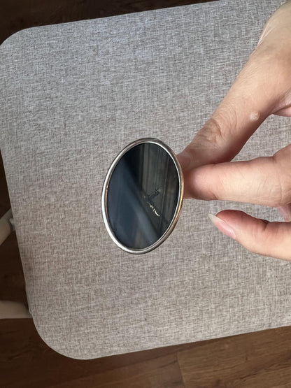 large black oval ring close-up