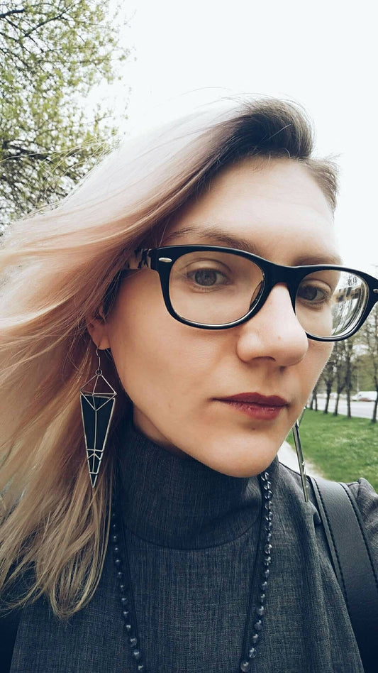 Geometric earrings photographed on model – perfect gift for gothic style lovers or modern best friend