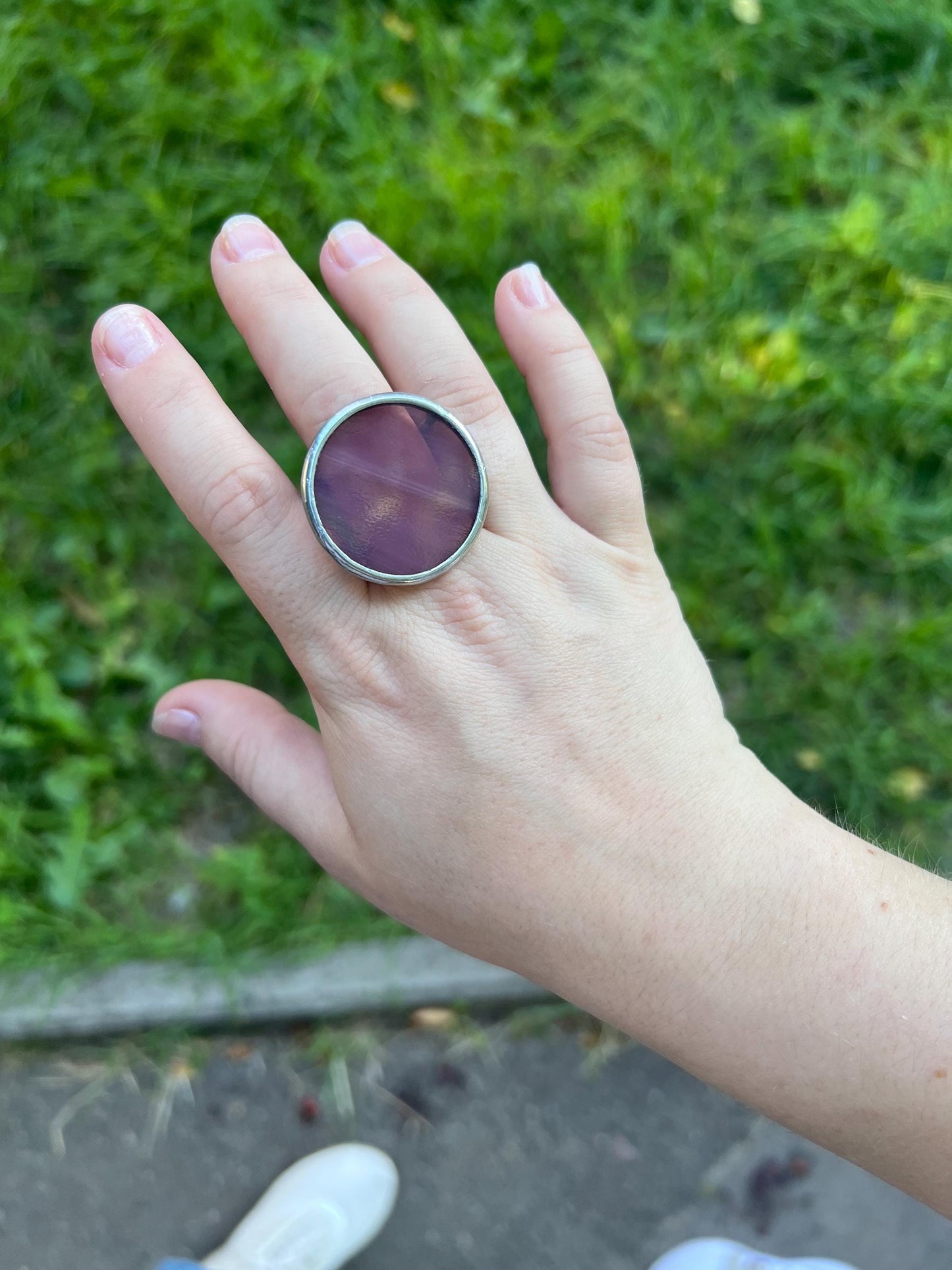 Round bold plum ring with metallic frame