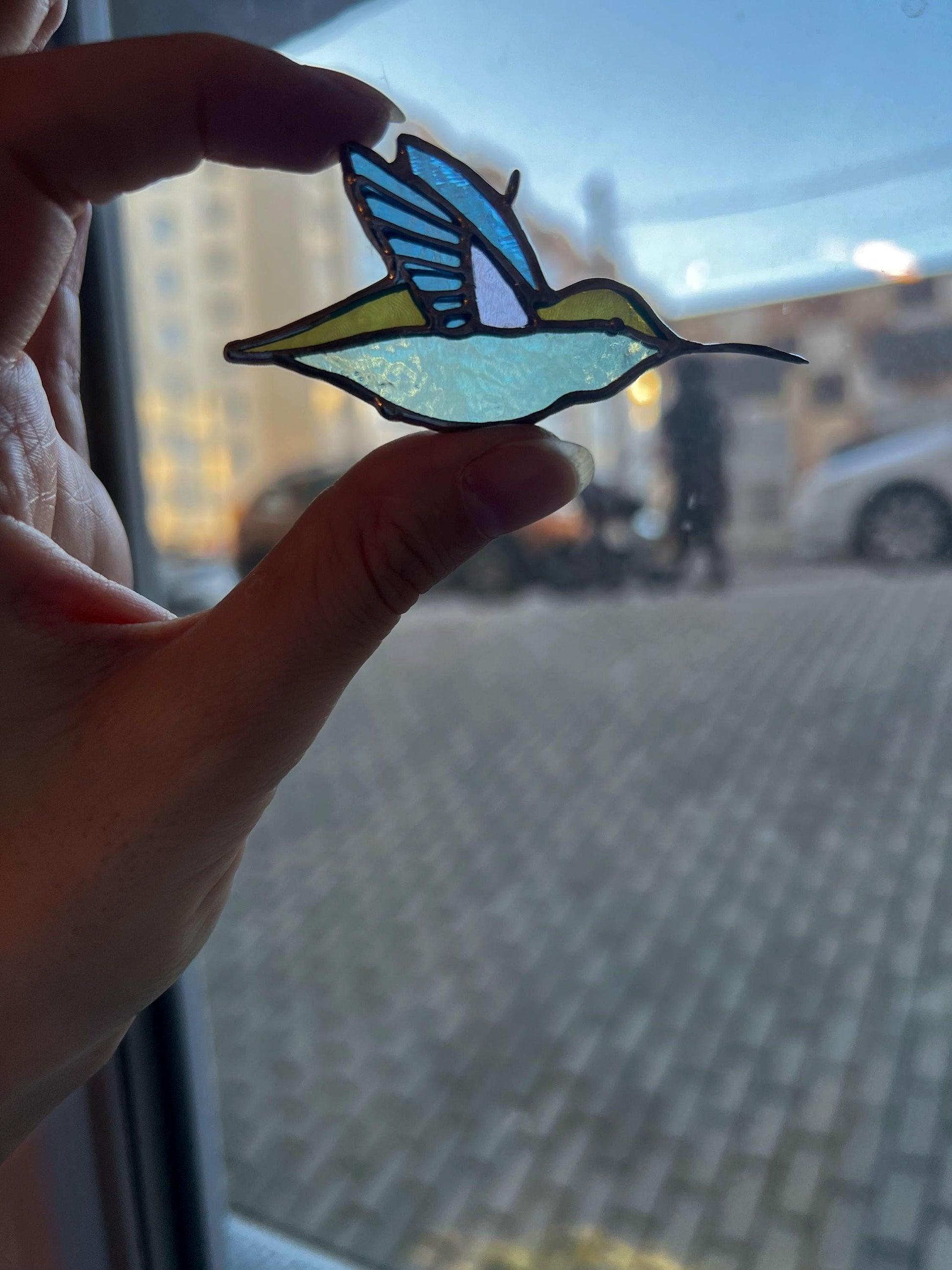 Stained glass hummingbird suncatcher in turquoise, handmade window hanging