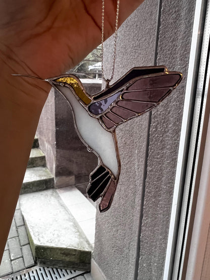 Handmade stained glass hummingbird suncatcher with purple and white wings, window hanging decor