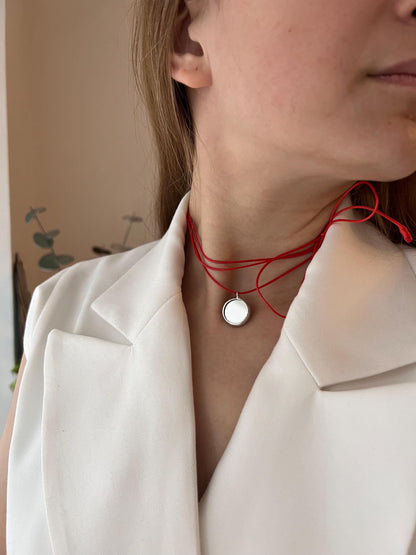 Red cord mirror choker necklace on model