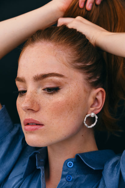 Artisan metal earrings minimalist design