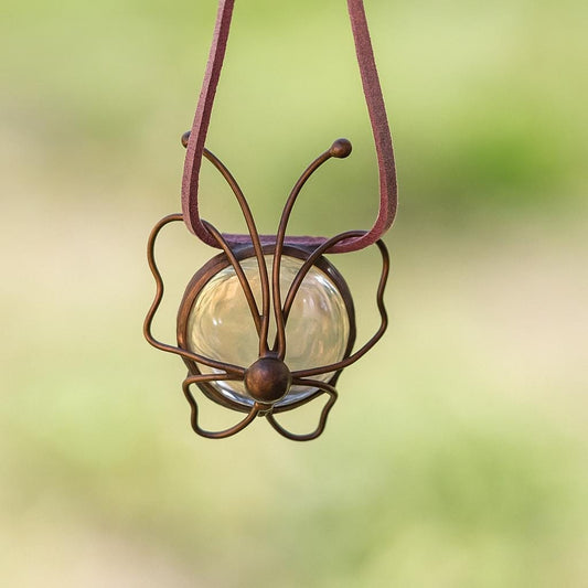 amber stained glass butterfly pendant close-up