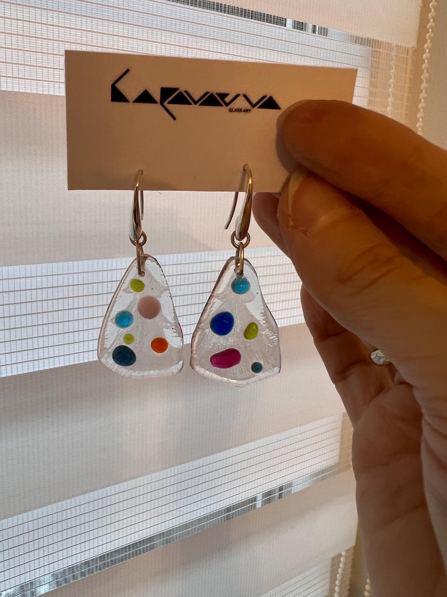 Fused glass Christmas tree earrings on display card with sterling silver hooks