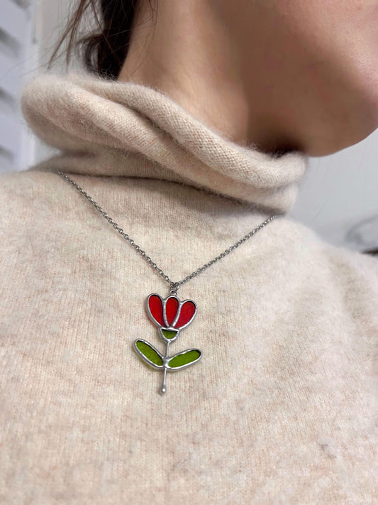 stained glass flower pendant necklace on sweater