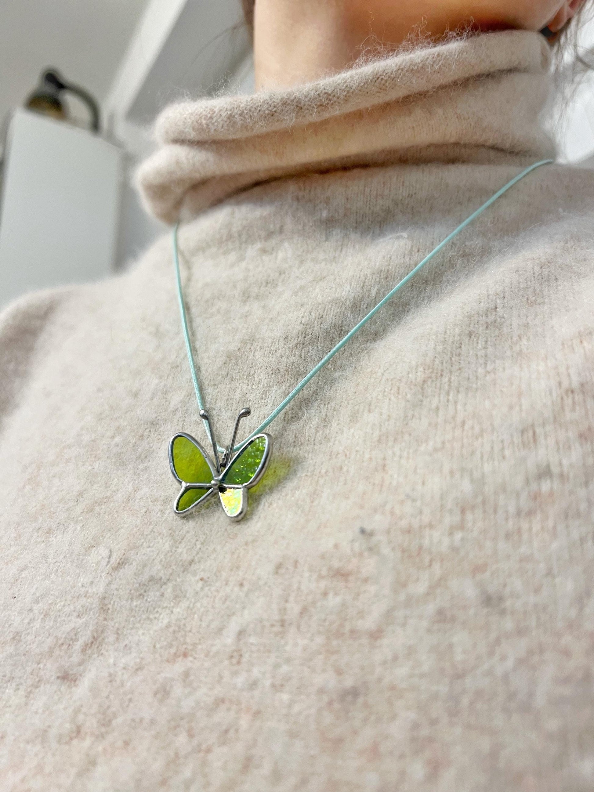 Butterfly necklace showing wing texture and solder details