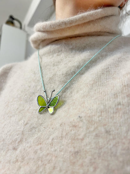 Butterfly necklace showing wing texture and solder details