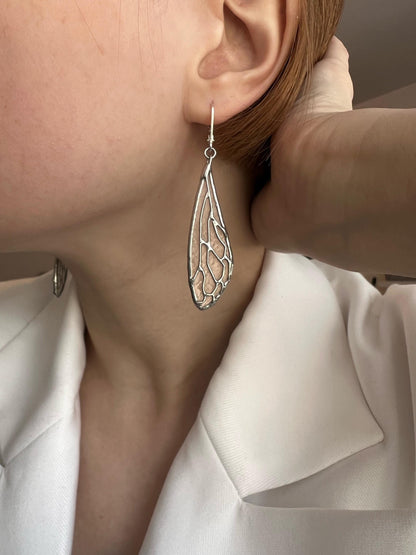 cicada wing earrings on ear lightweight elegant jewelry