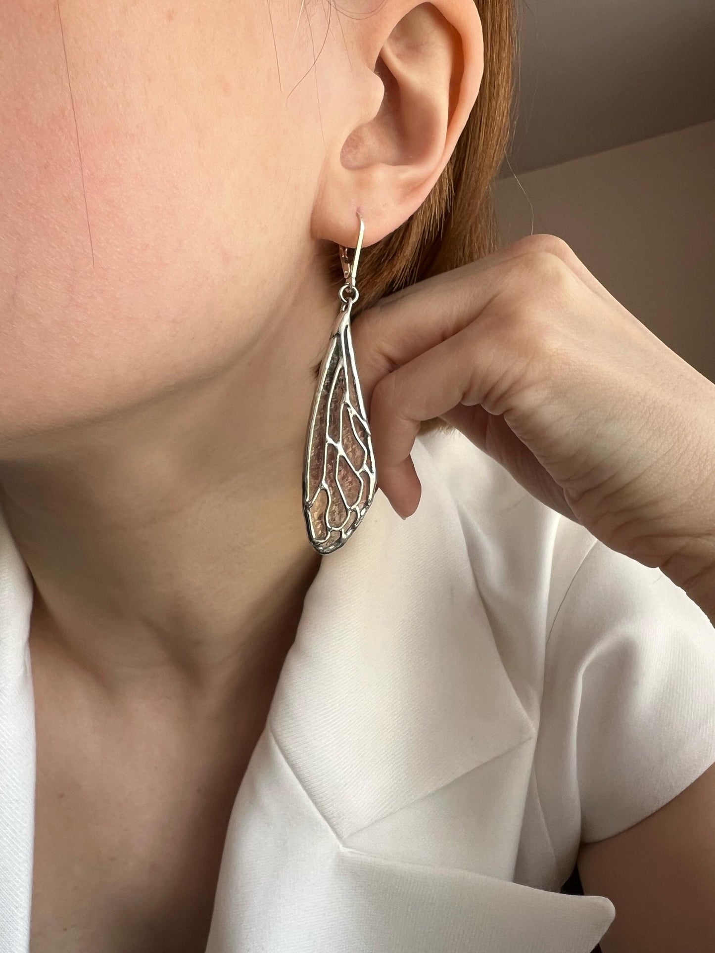 long silver cicada wing earrings minimalist style
